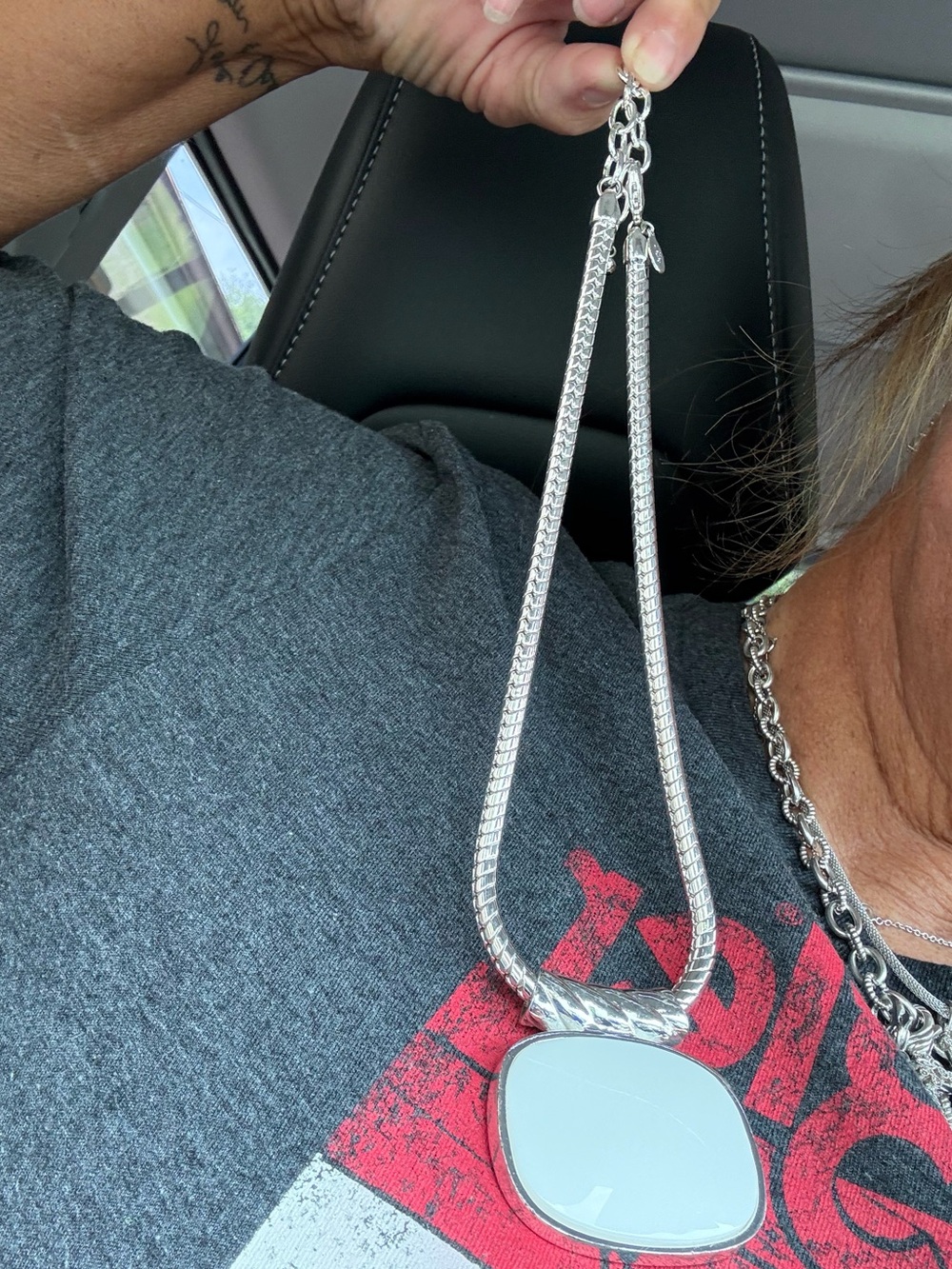 Beautiful Joan River silver Necklace with large coral Stone -